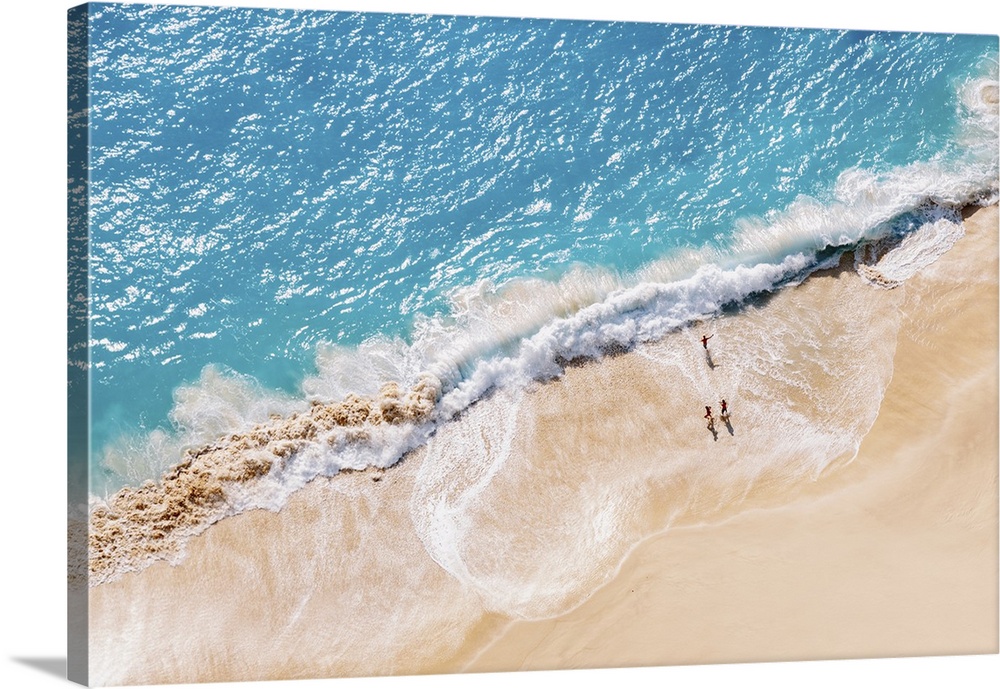 Aerial view to tropical sandy beach and blue ocean.