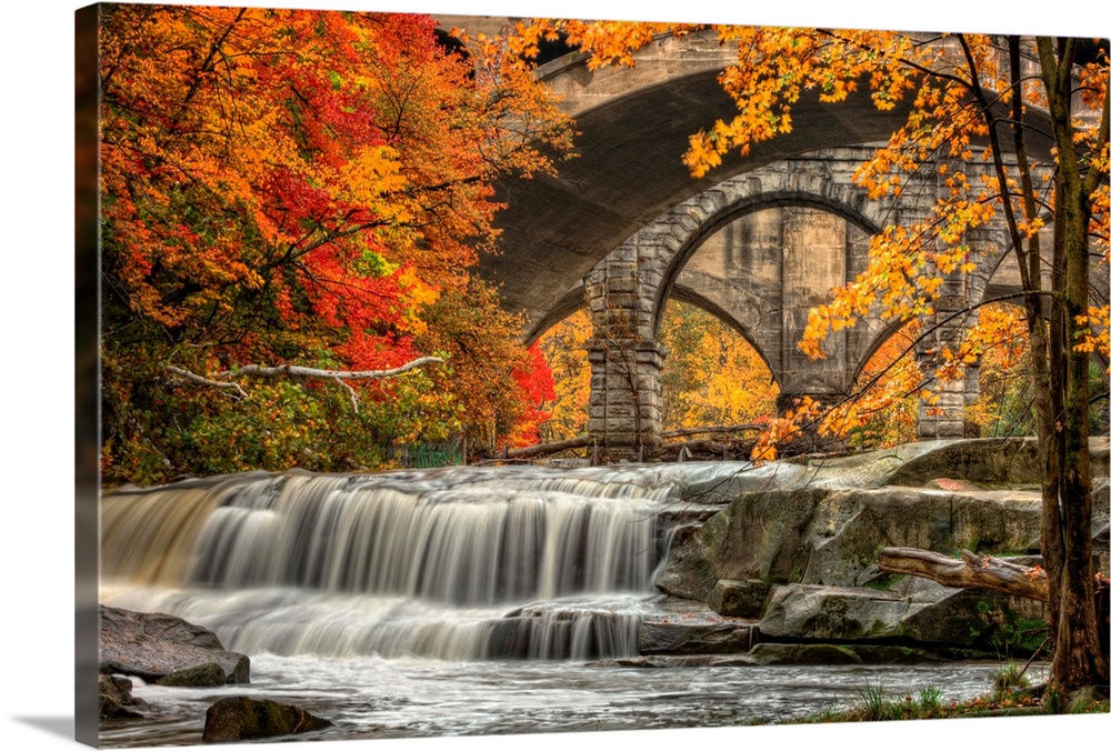 Berea Falls, Ohio, during peak fall colors. This cascading waterfall looks it's best with peak autumn colors in the trees....