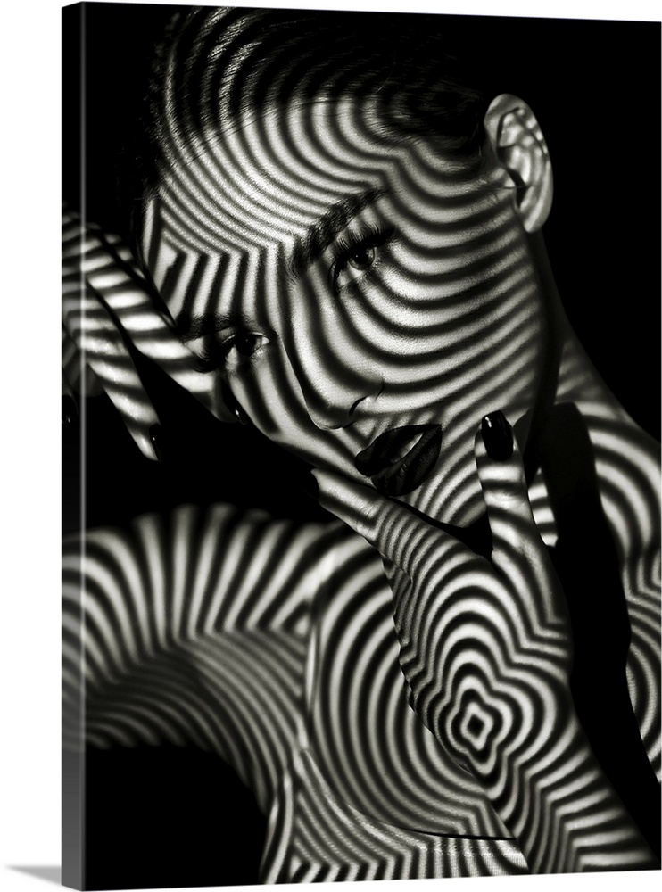 Black And White Portrait Of A Girl With A Striped Shadow Pattern On The Face And Body