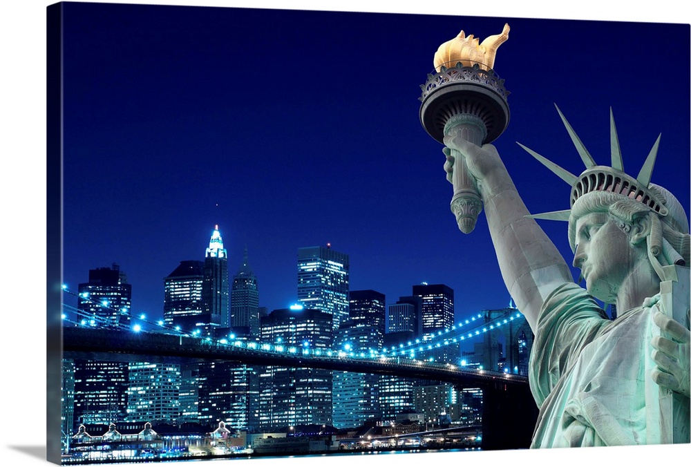Brooklyn Bridge and The Statue of Liberty at Night, New York City.