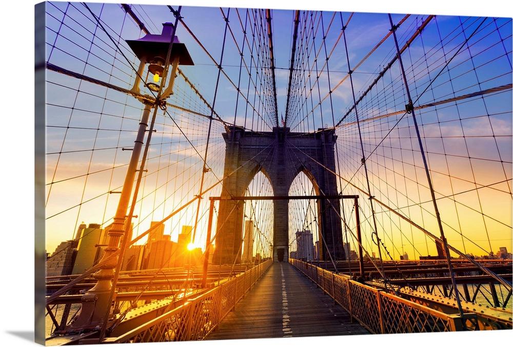 Brooklyn Bridge at sunset in New York City.