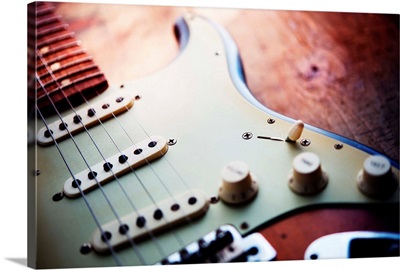 Electric guitar on an old wooden surface