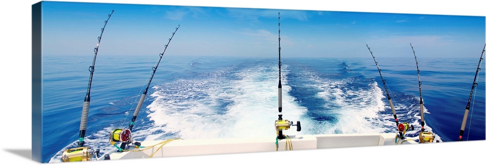 Fishing reels with cast lines off the back of a boat Solid-Faced Canvas  Print