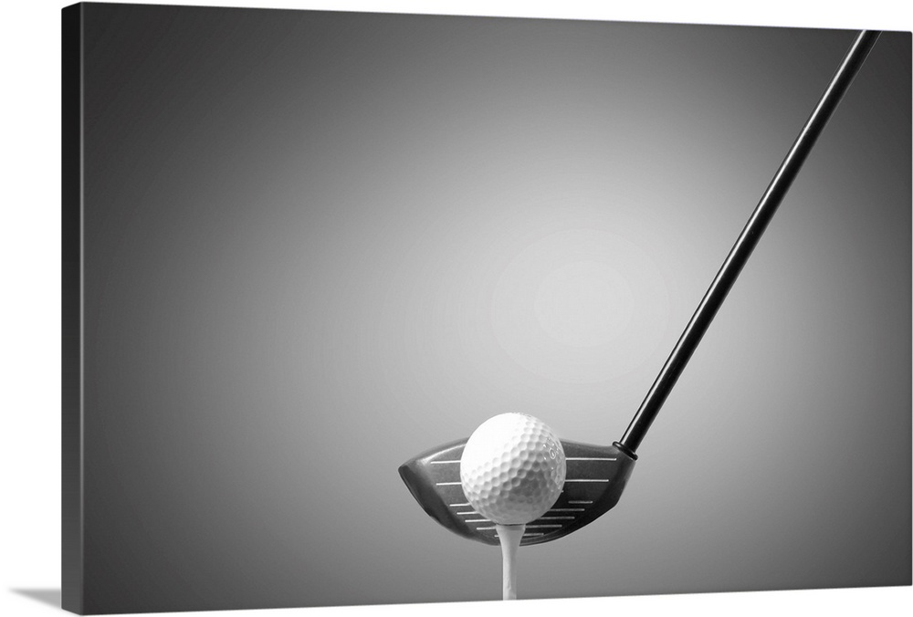 Detail of a golf club and ball