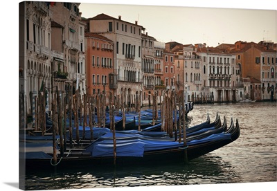 Gondola Park In Water In Venice Canal With Historical Buildings, Italy
