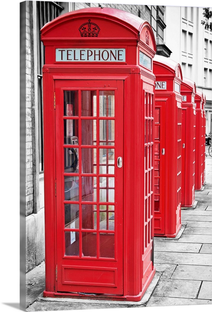 Row of iconic London red phone cabins with the rest of the picture in black and white