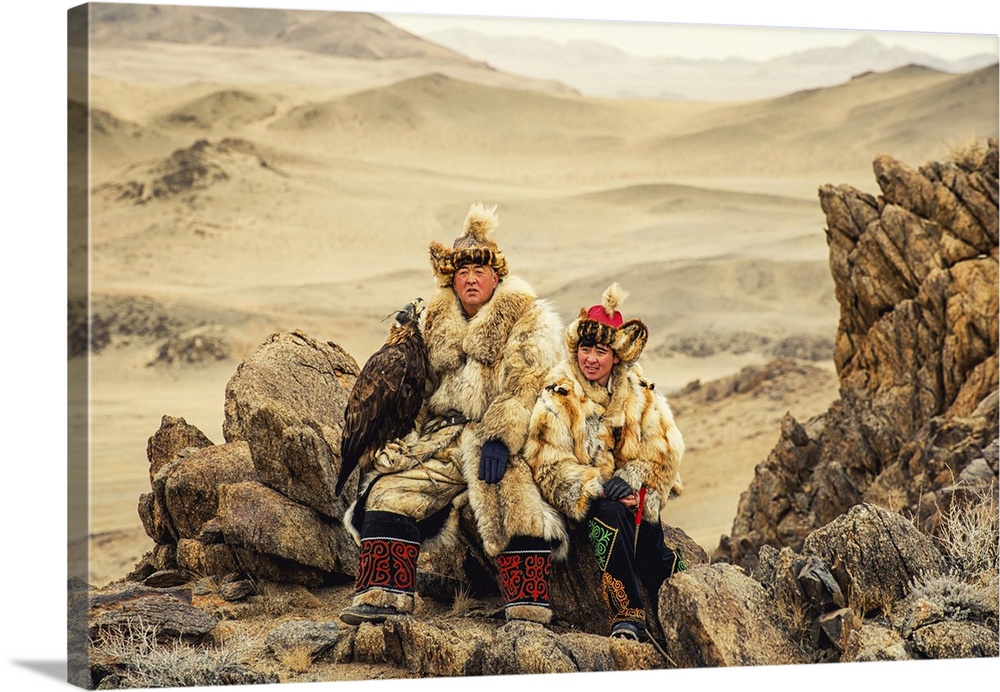 Kazakh Eagle Hunter In Desert Mountains, Golden Eagle Festival, Olgei, Mongolia