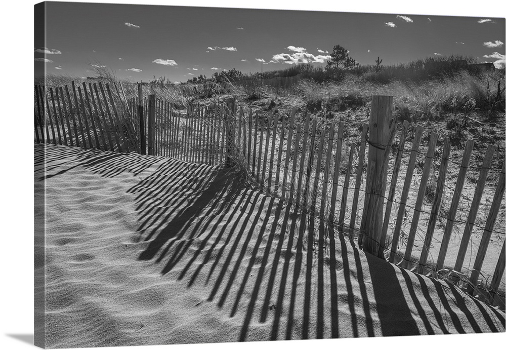 Long Winter shadows along the sand dunes in Long Branch along the Jersey shore.