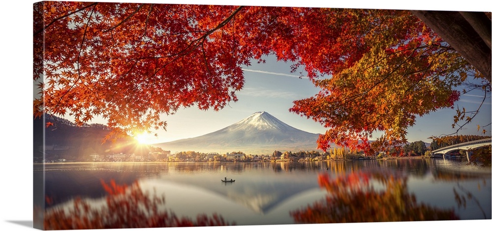 Colorful autumn season and mountain Fuji with morning fog and red leaves at lake Kawaguchiko is one of the best places in ...
