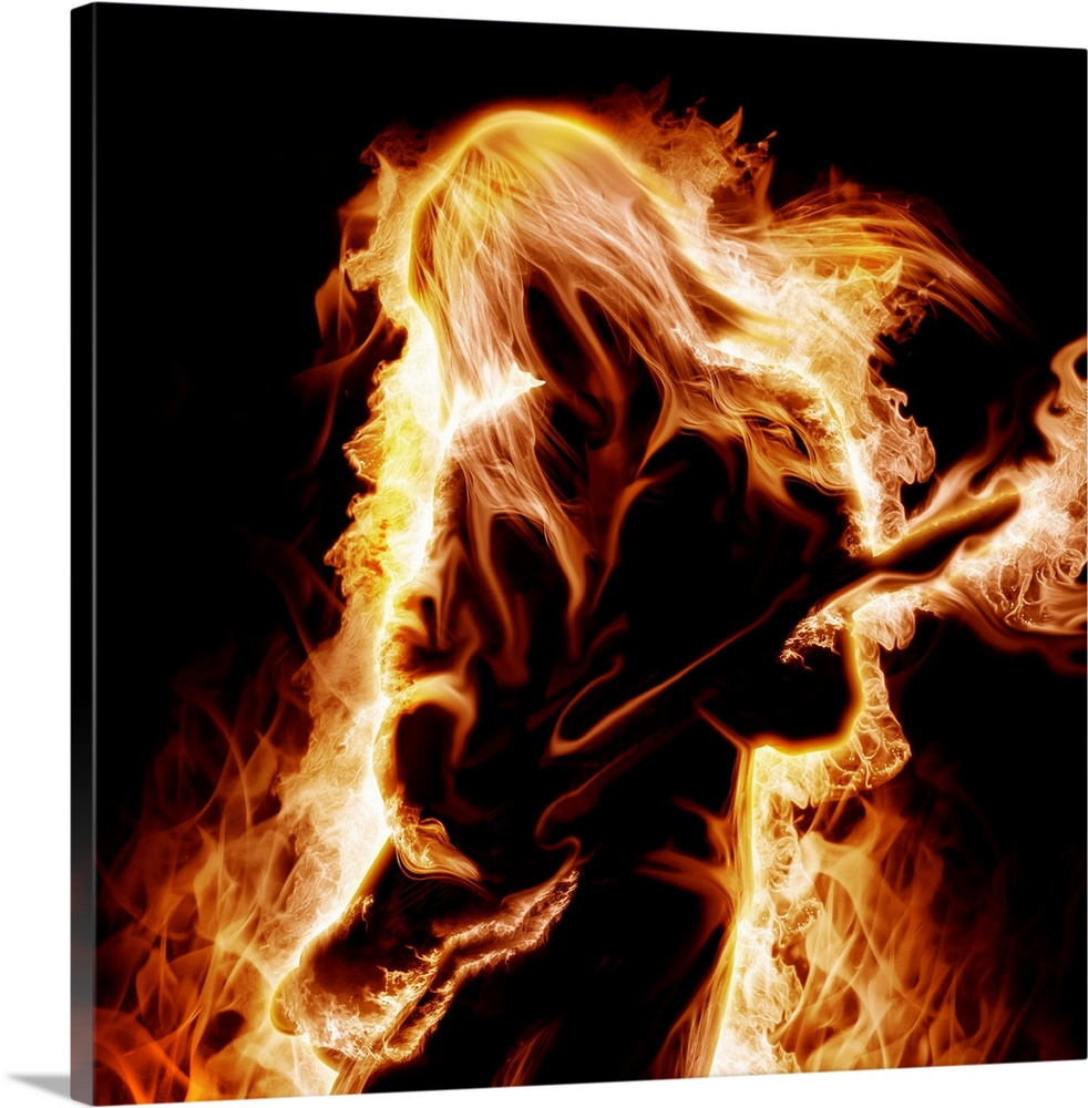 Musician with an electronic guitar enveloped in flames on a black background