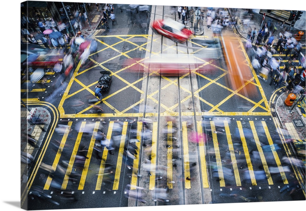 People And Taxi Cabs At A Busy Crossroads In The Central District, Hong Kong, China