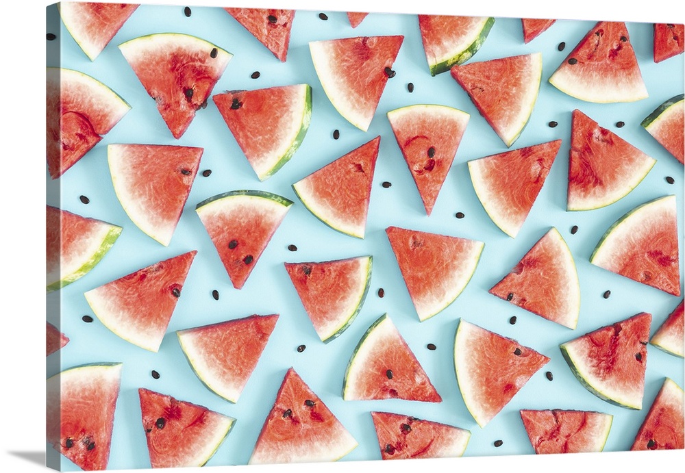 Watermelon pattern. Red watermelon on blue background. Summer concept. Flat lay, top view, copy space.