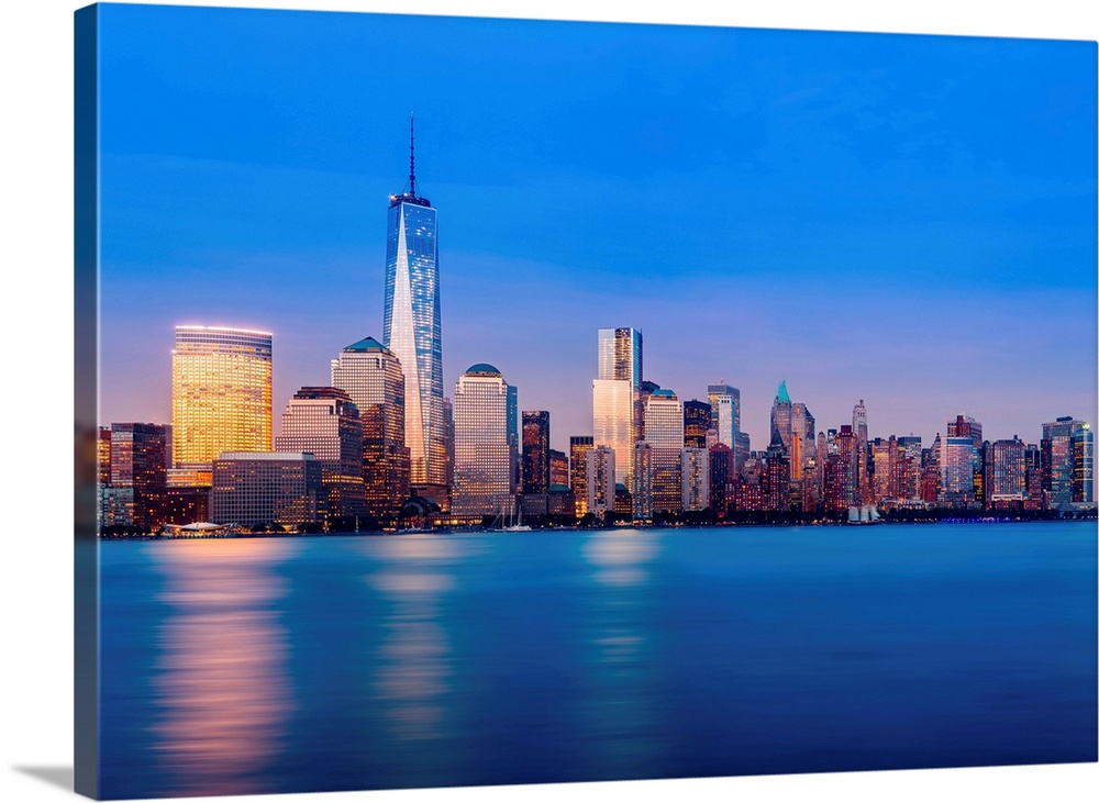 Skyline of lower Manhattan of New York City at night with new One World Trade Center.
