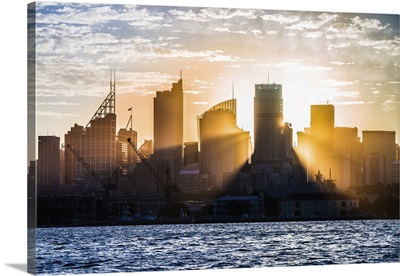 Sun Rays Shining Through The Skyline Of Sydney