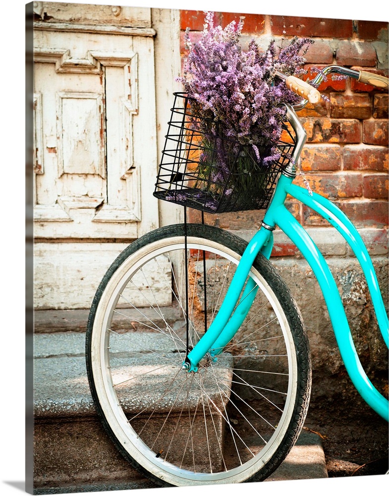Vintage Bycycle With Basket With Lavender Flowers Near The Wooden Door