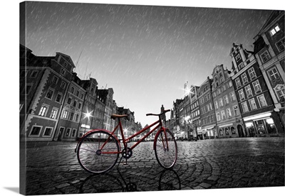 Vintage Red Bike On Cobblestone Historic Wroclaw In Rain, Poland