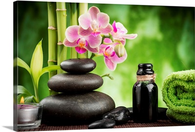 Zen basalt stones, orchid and candle