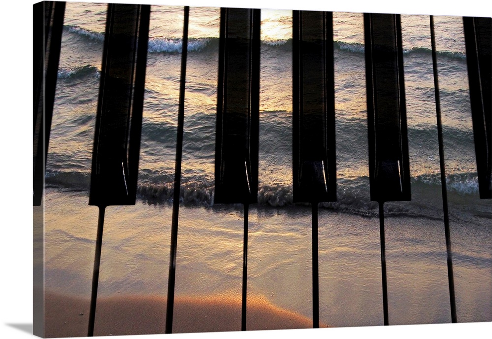 Big photograph focuses on the keys of a piano that have another picture of a sea crashing into a sandy beach laid out with...