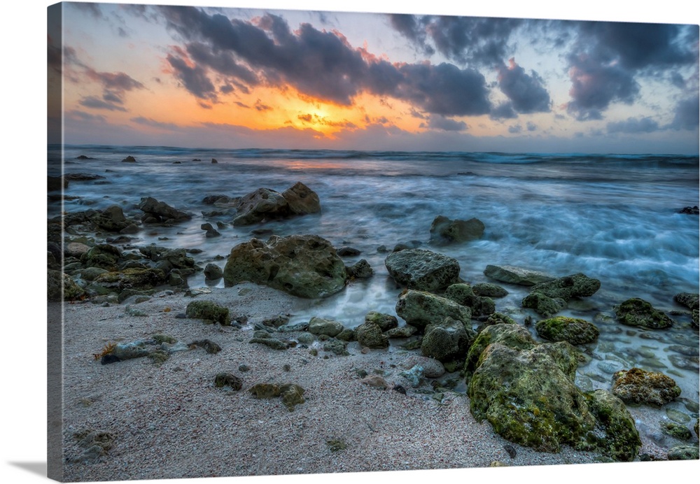 Sunrise on the Mayan Rivera beach front with a beautiful ocean view and sky.