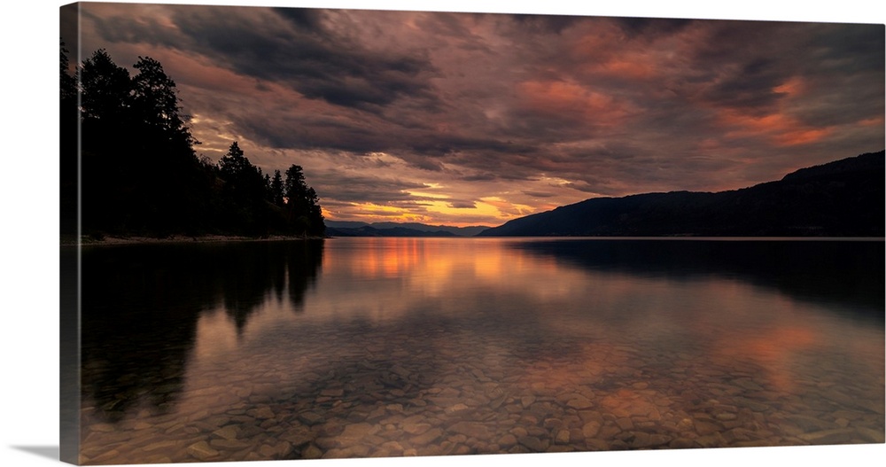 Sunset modeled skies reflecting off Okanagan Lake in British Columbia, Canada.