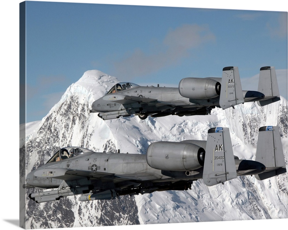 April 24, 2007 - Two A-10 Thunderbolt IIs fly over the Pacific Alaska Range Complex during live-fire training.