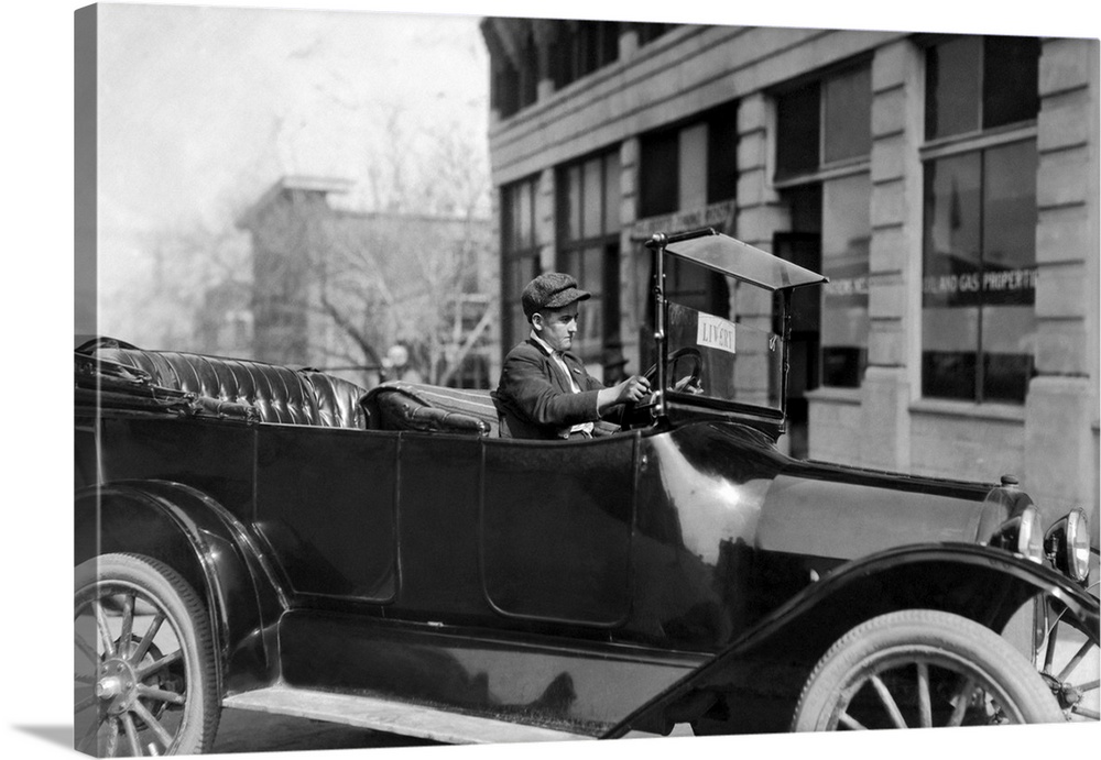 A 15-year-old chauffeur driving a taxi in Tulsa, Oklahoma, March 1917.
