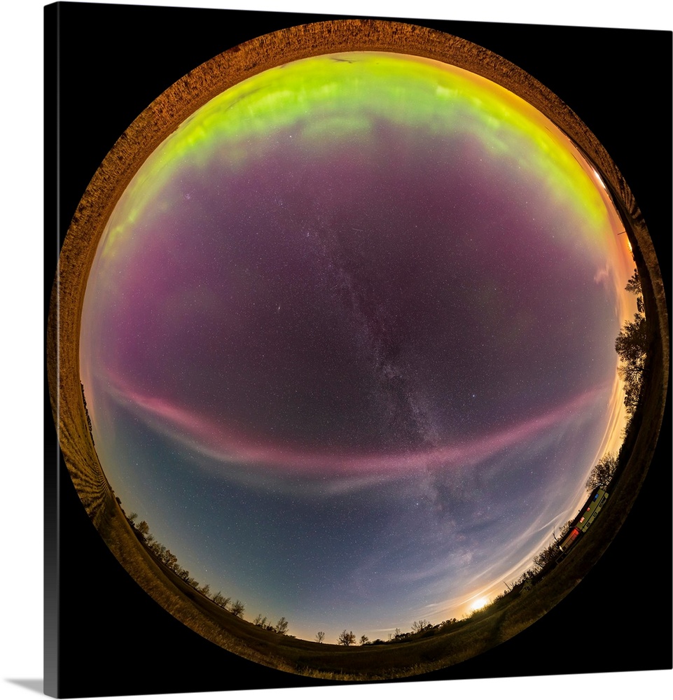 A 360 degree fish-eye panorama of a colorful auroral arc, Alberta, Canada.