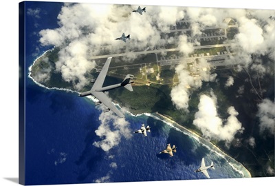A B52 Stratofortress leads a formation of aircraft over Guam