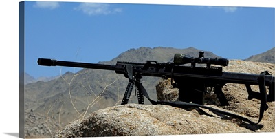 A Barrett .50-caliber M107 Sniper Rifle sits atop an observation point in Afghanistan