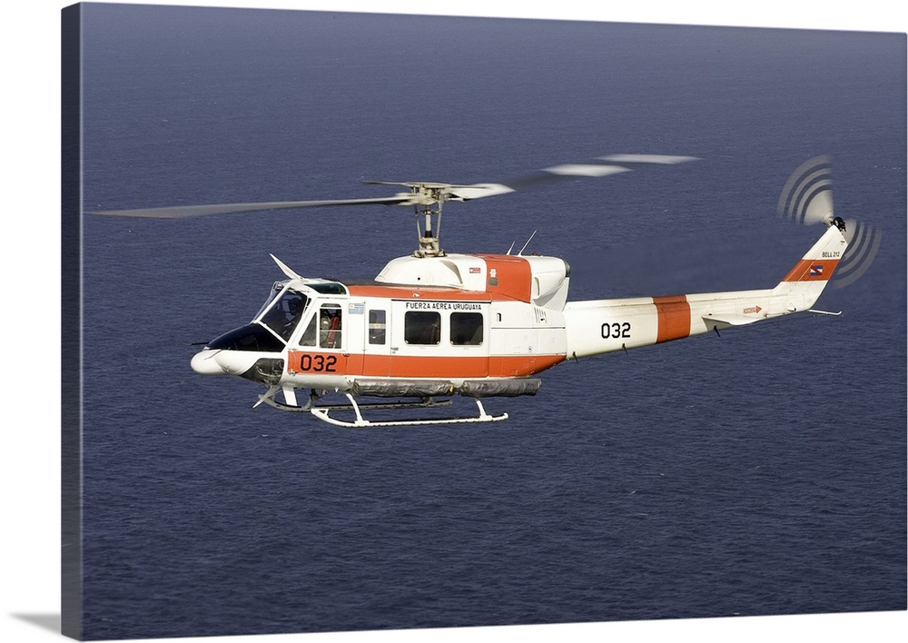 A Bell 212 helicopter of the Uruguayan Air Force off the coast of Montevideo, Uruguay.