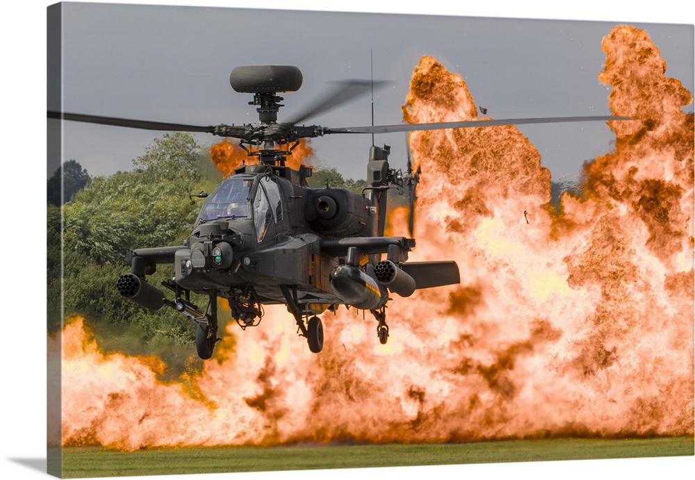 A British Army WAH-64D Apache in front of a wall of fire at RAF Fairford in the United Kingdom.
