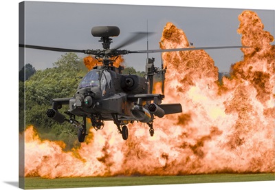 A British Army WAH-64D Apache Helicopter In Front Of A Wall Of Fire