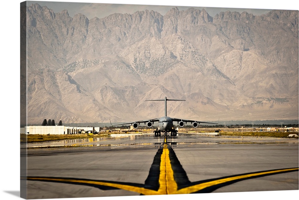 A C-17 Globemaster III taxis to its parking spot at Bagram Airfield.