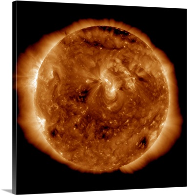 A dark rift in the suns atmosphere known as a coronal hole