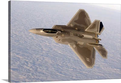 A F-22A Raptor aggressively banks