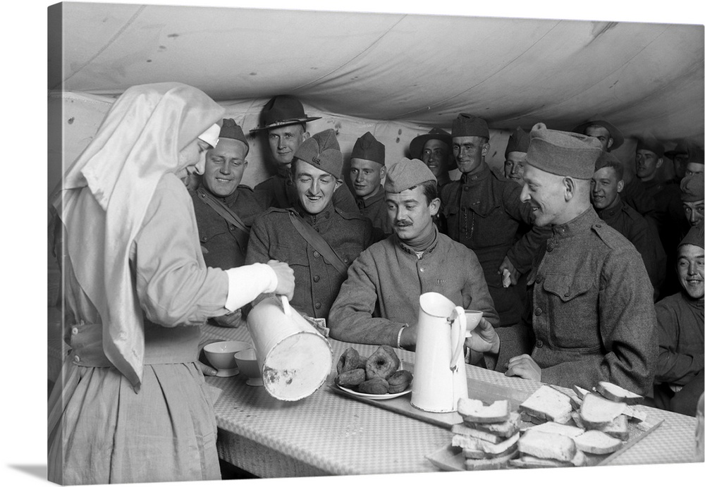 A French infantryman surrounded by Americans in an American red cross canteen.