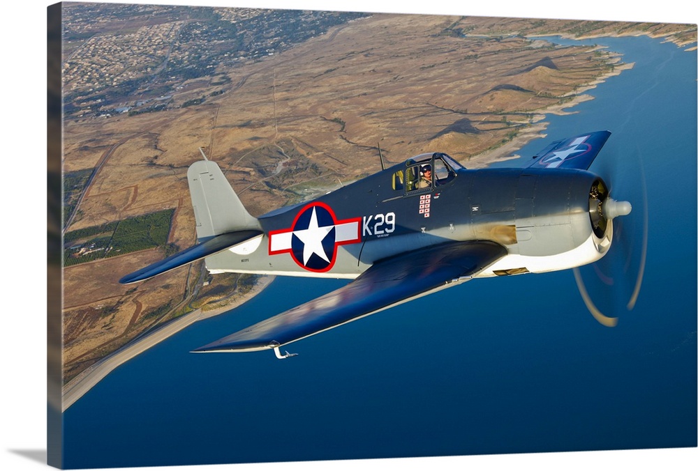 A Grumman F6F Hellcat fighter plane in flight over Chino, California.