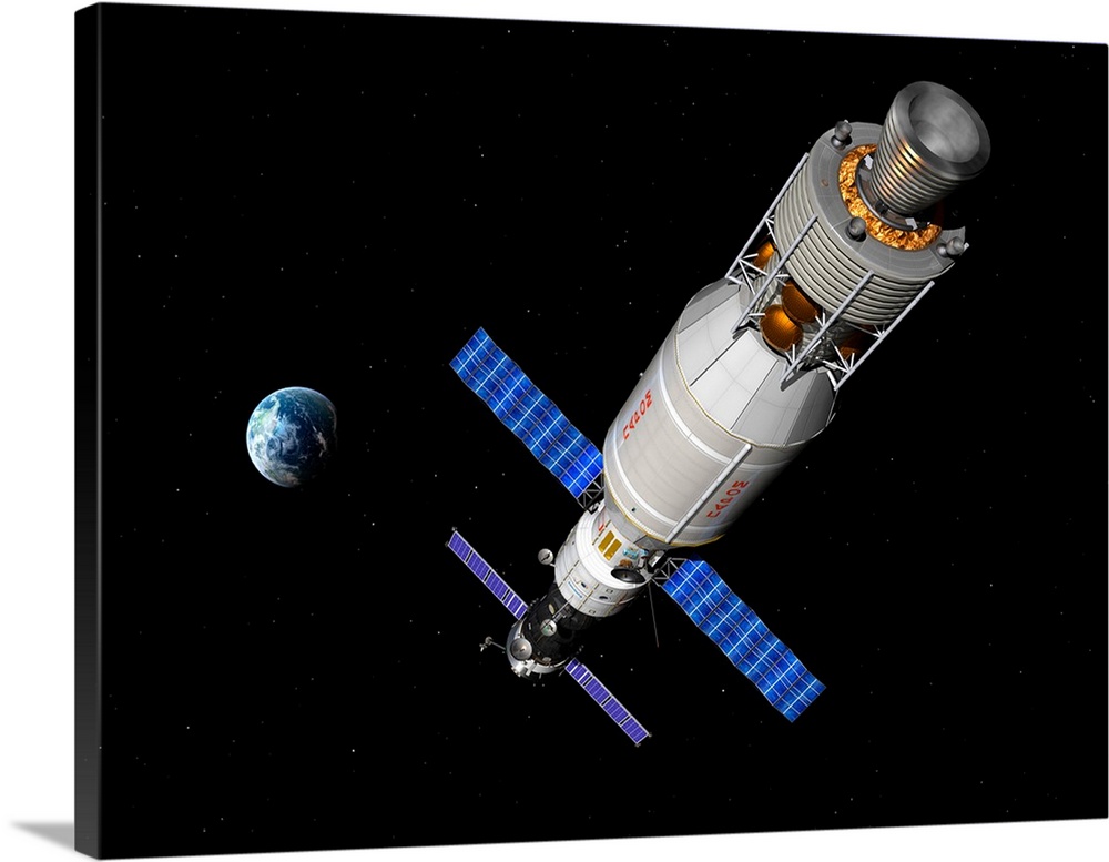 A manned Soyuz TMA-M spacecraft docked with an extended stay module.