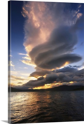 A massive stacked lenticular cloud over Tjedsundet in Troms County, Norway