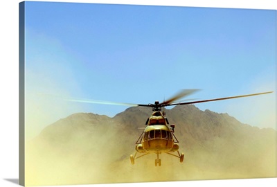 A Mi17 Hip helicopter hovers over a firing range in Afghanistan