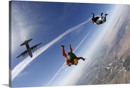 A military freefall parachutist course student conducts a HALO jump ...