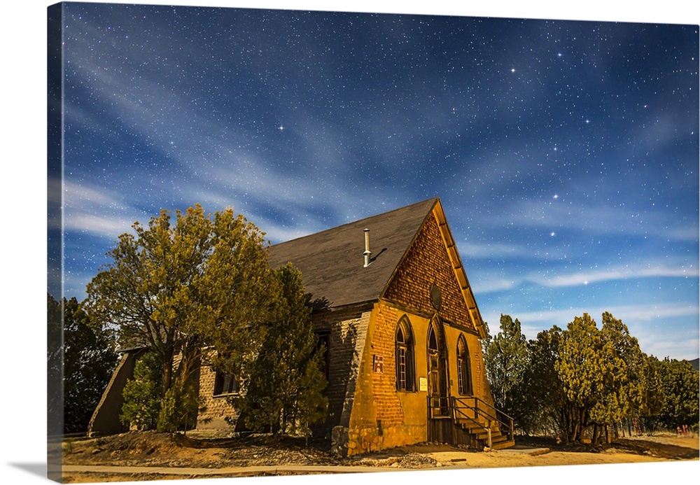 January 27, 2015 - A moonlit nightscape of the historic Hearst Church in Pinos Altos, New Mexico, at 7000 feet altitude (t...