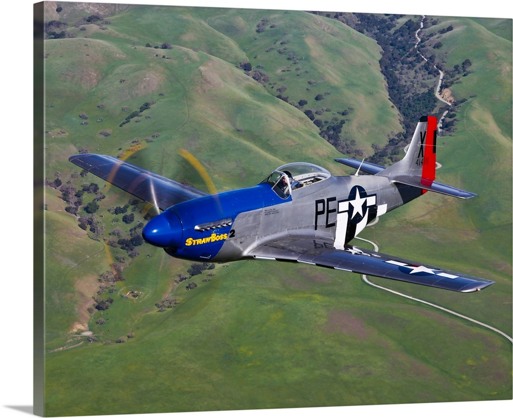 A P-51D Mustang in flight over Hollister, California.