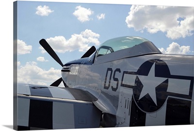 A P-51D Mustang parked on the flight line