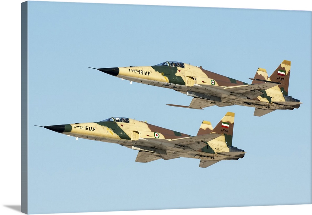 A pair of Islamic Republic of Iran Air Force HESA Saegheh I aircraft in flight.
