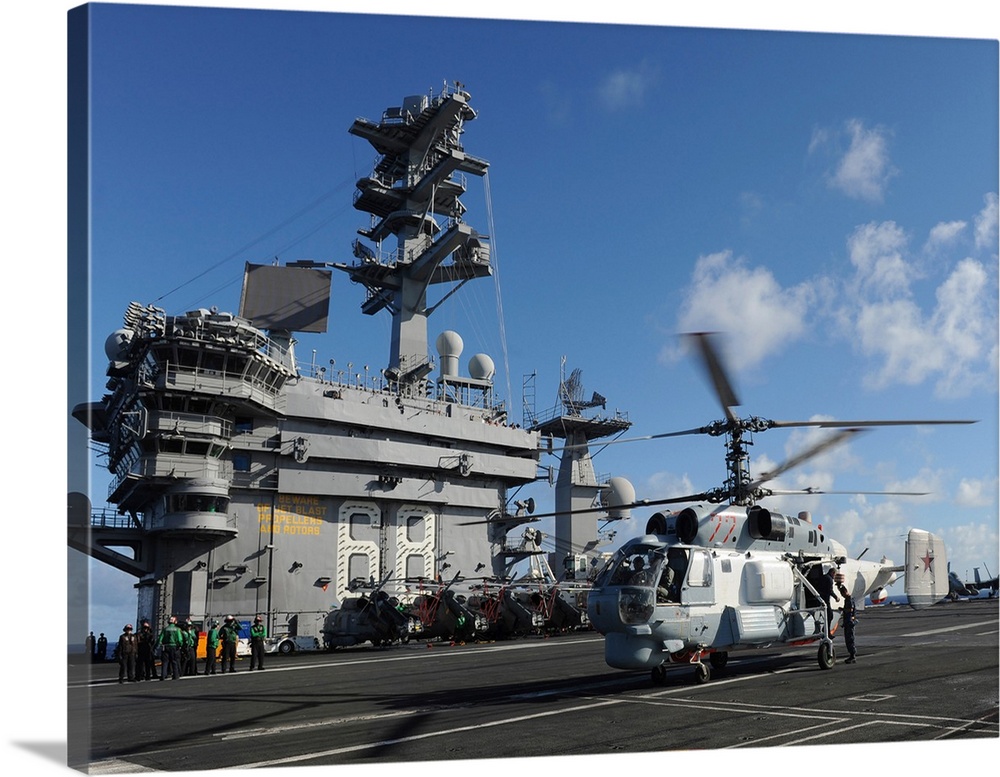 A Russian Navy KA-27 Helix helicopter lands aboard USS Nimitz.