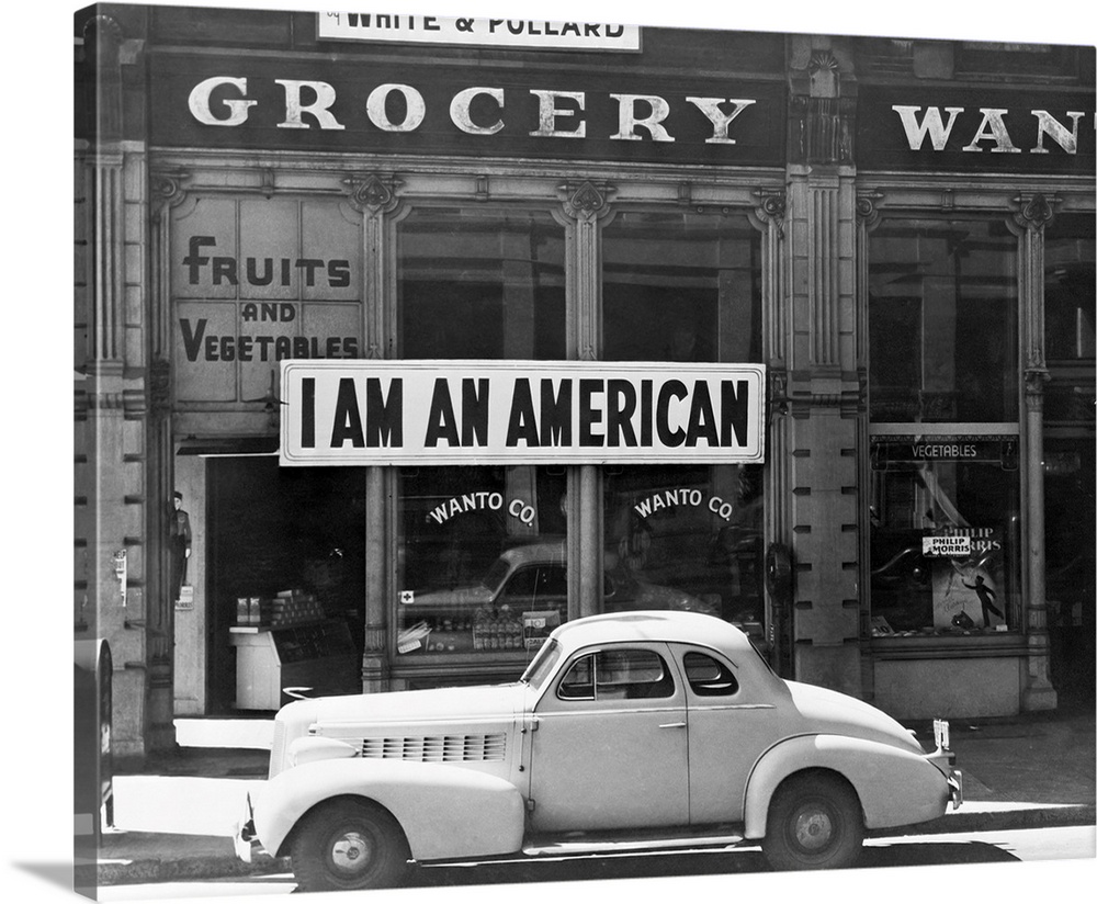 A shop owned by Japanese Americans, bearing a sign reading, I am an American.