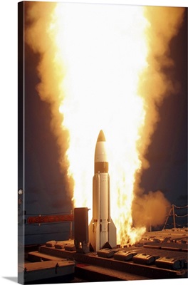 A Standard Missile Three is launched from the vertical launch system