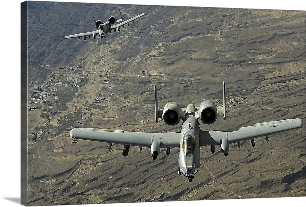 A twoship A10 Thunderbolt II formation flies a combat mission over Afghanistan