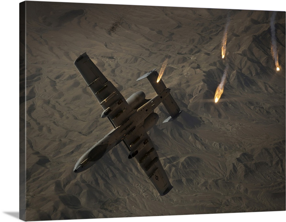 A U.S. Air Force A-10 Thunderbolt II pops flares.
